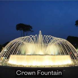 A grand fountain featuring a steady stream of water, serving as a focal point